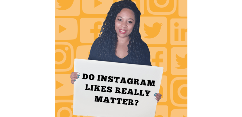 Kerry Holding A Sign - Do Instagram Likes Really Matter?